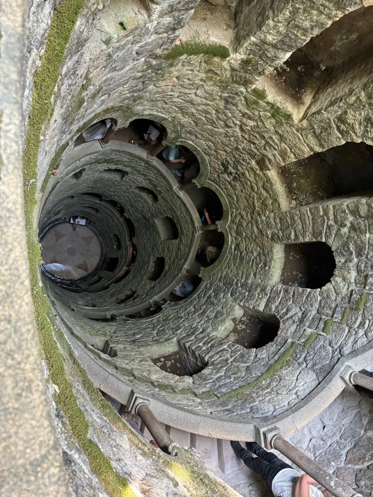 Spiral stairs descending the initiation well at Quinta da Regaleira in Sintra