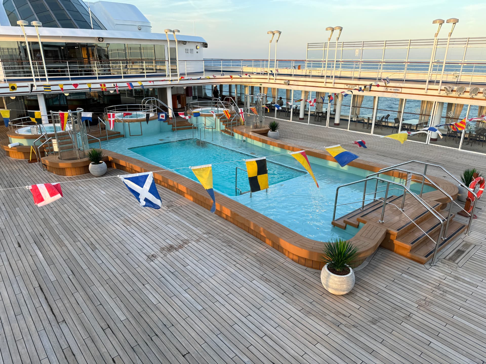 Main pool deck aboard Silver Spirit dressed with signal flags