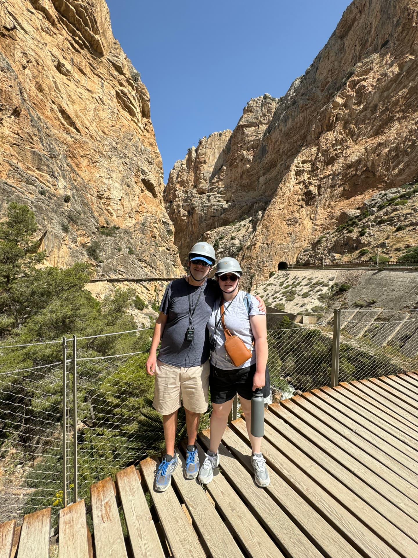 Ben and his wife in helmets on the Caminito del Rey walkway
