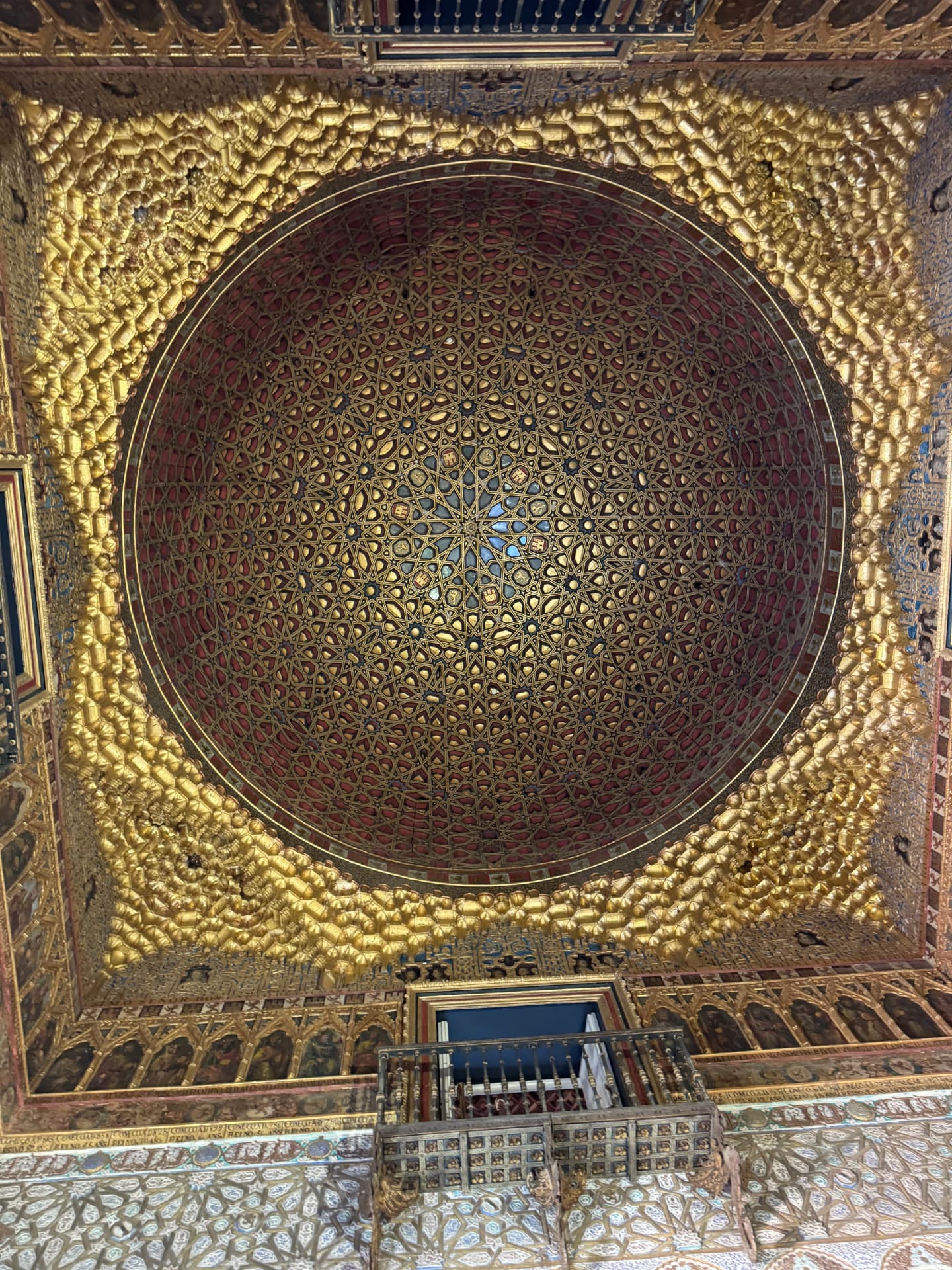 The gilded dome ceiling inside the Royal Alcázar of Seville