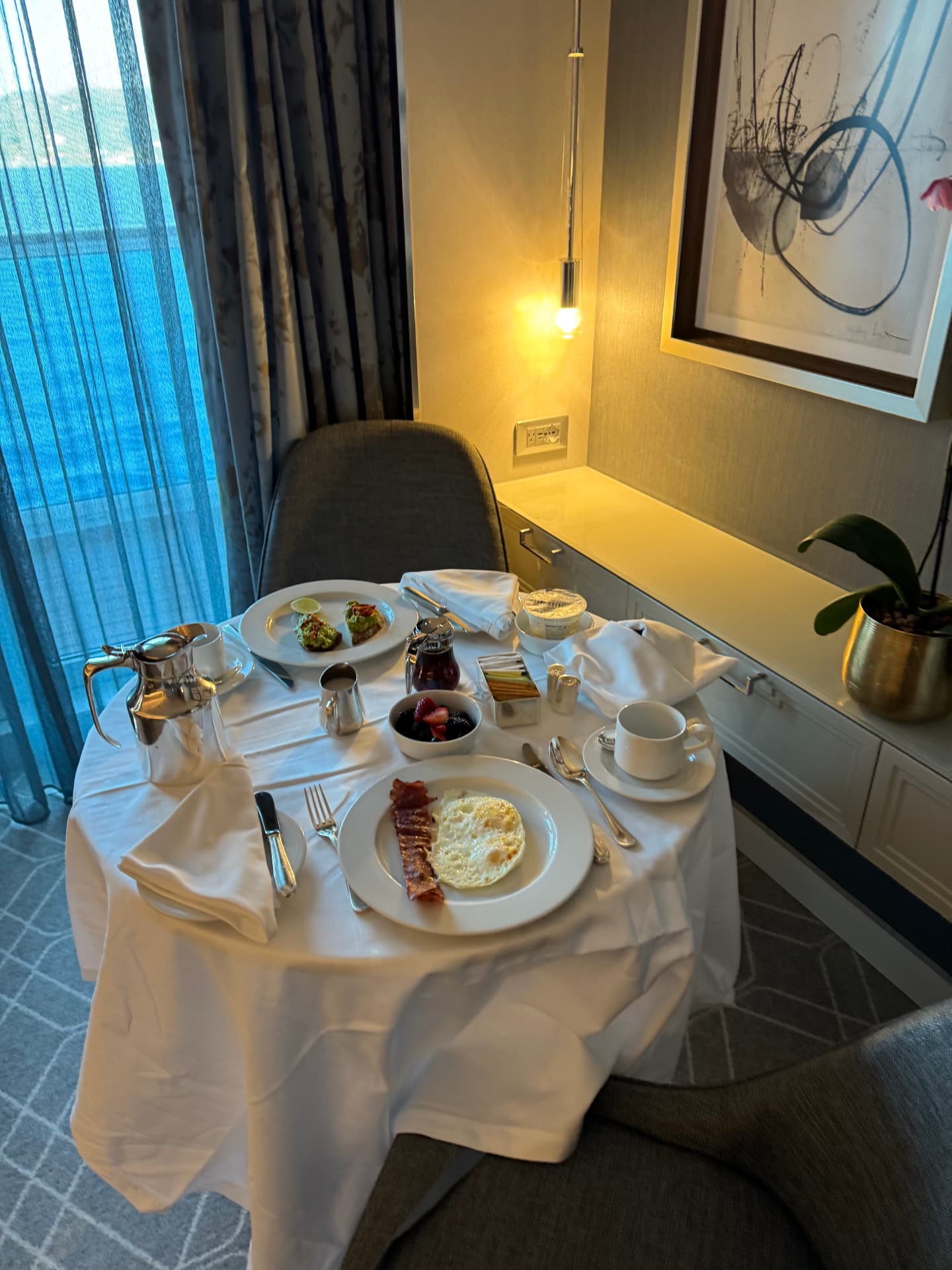 In-suite breakfast served on a private balcony aboard Oceania Vista