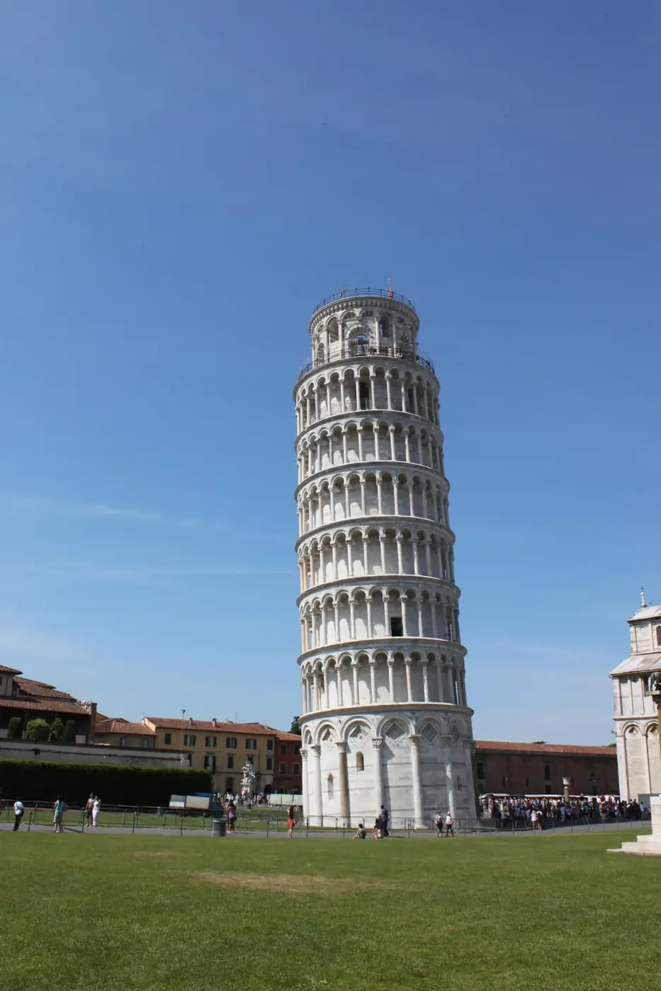 The Leaning Tower of Pisa above the green of the Piazza dei Miracoli