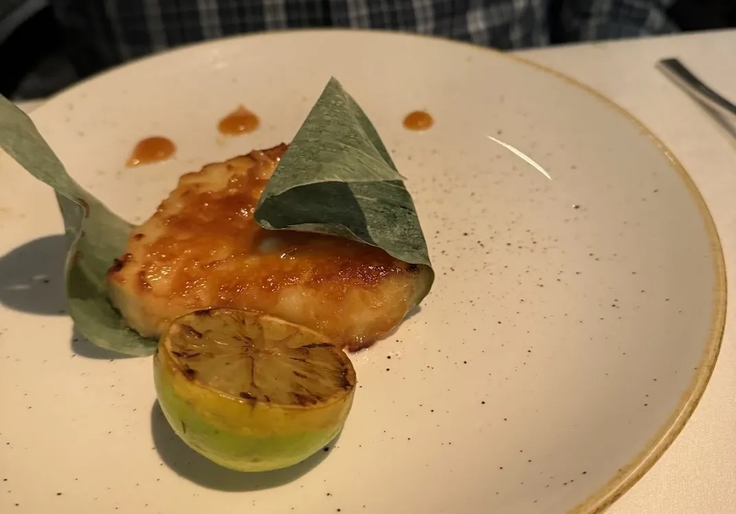 Miso-glazed black cod plated aboard Oceania Cruises