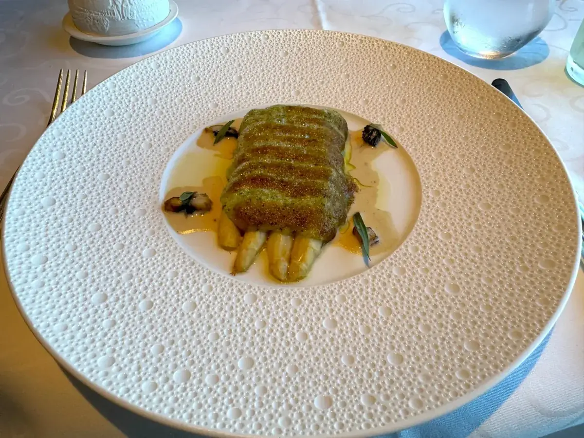 Poached halibut with white asparagus and morels at Chartreuse on Regent Seven Seas