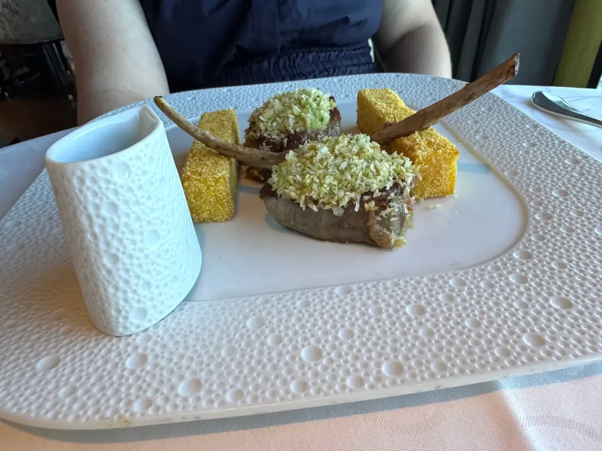 Herb-crusted rack of lamb with polenta at Chartreuse on Regent Seven Seas