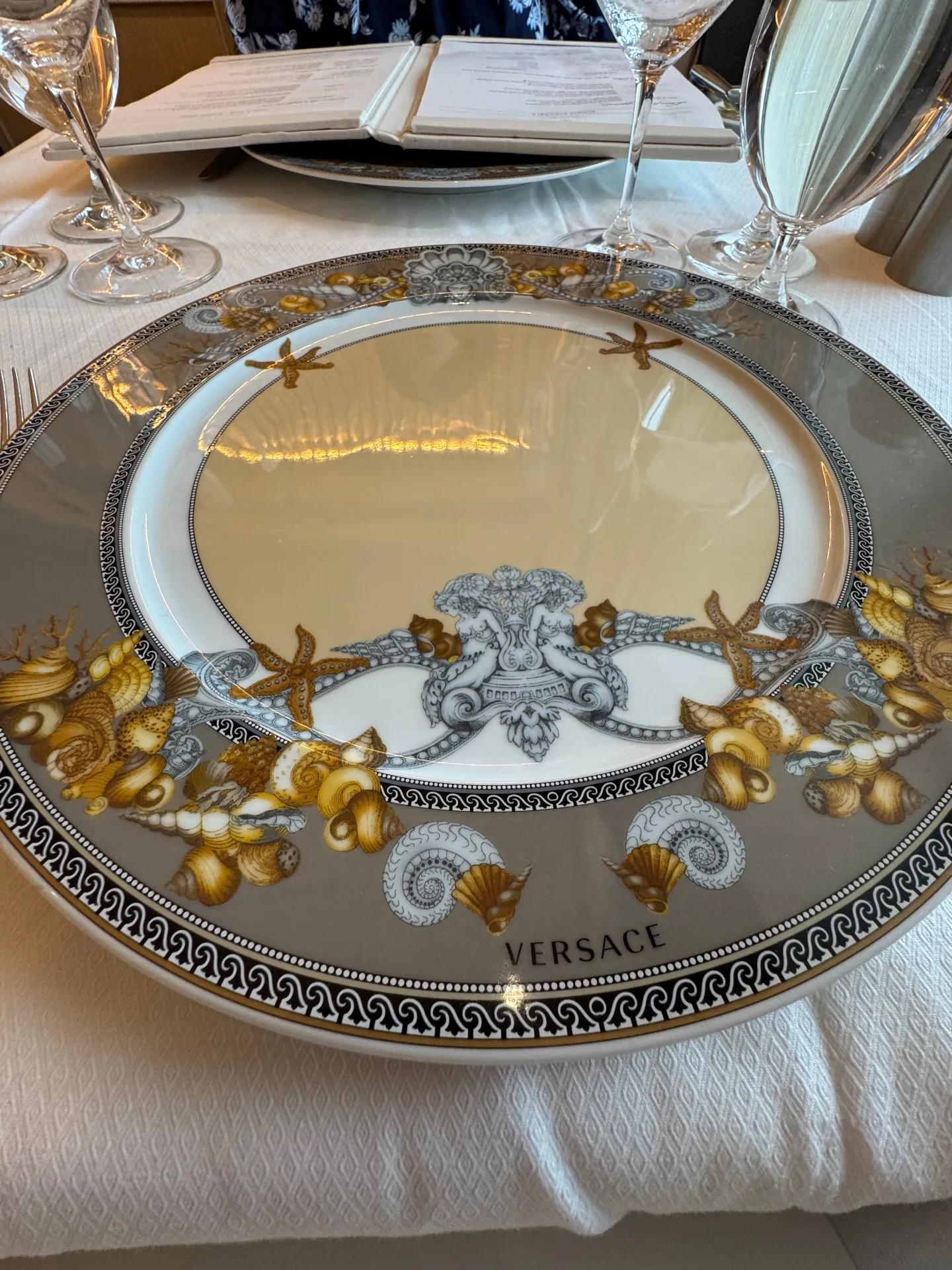 Versace charger plate used in Compass Rose on Regent Seven Seas
