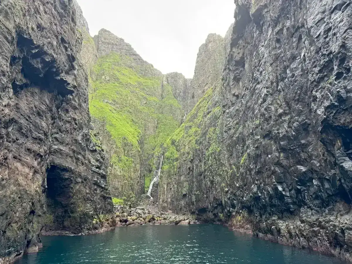 The Vestmanna sea cliffs in the Faroe Islands seen from a small boat