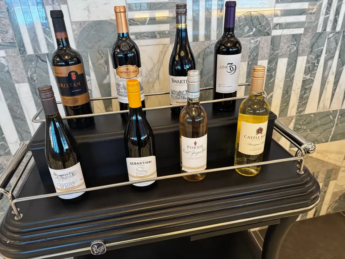 Wine cart with red and white bottles aboard a Regent Seven Seas ship